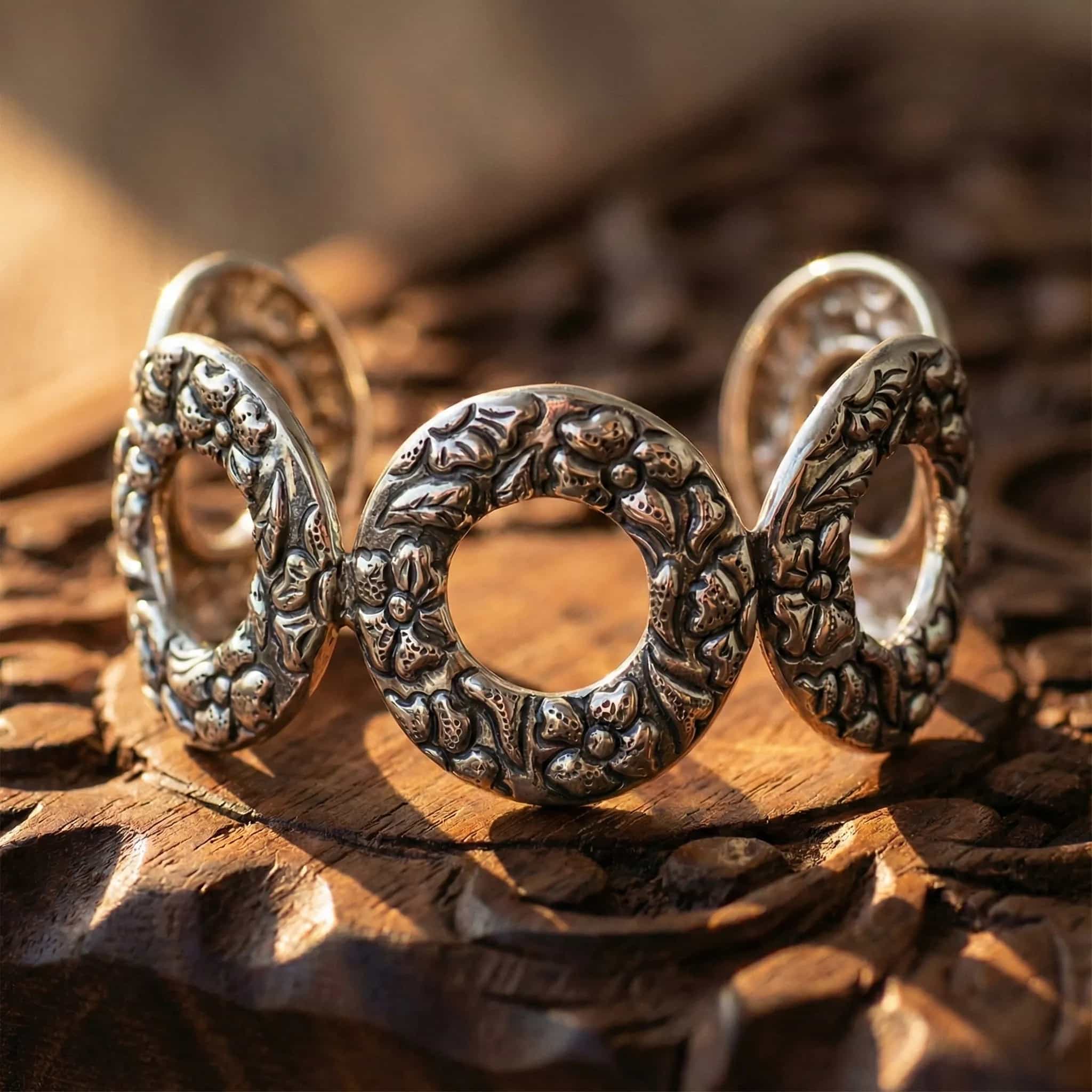 Hand carved silver floral relief cuff bracelet